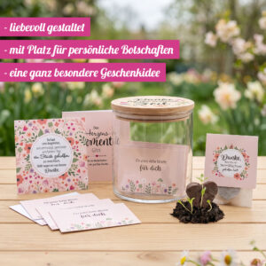 Gedankenglas Herzensmomente draußen auf dem Tisch dekoriert mit Wunschkarten, Glas, Grußkarte und Saatzherz